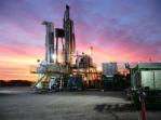 An oil well sunset An oil well sunset